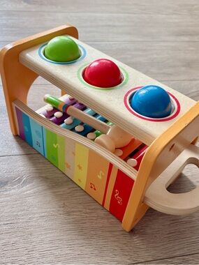 HAPE wooden tap & pound bench ball popper with slide out xylophone